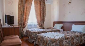 Двухместный номер с  2 отдельными кроватями в Гостинице Глория
